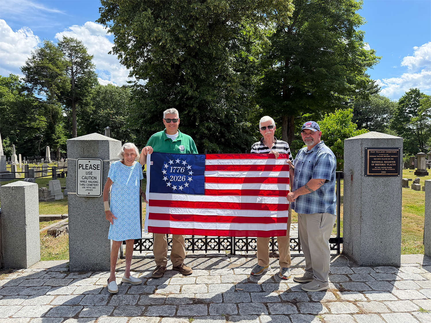 Friends of the Old Village Cemetery on Village Avenue in Dedham, MA gather to honor the more than 100 Revolutionary War soldiers buried or memorialized there.